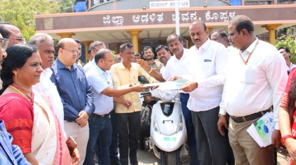 Distribution of motorized three-wheelers to the specially-abled