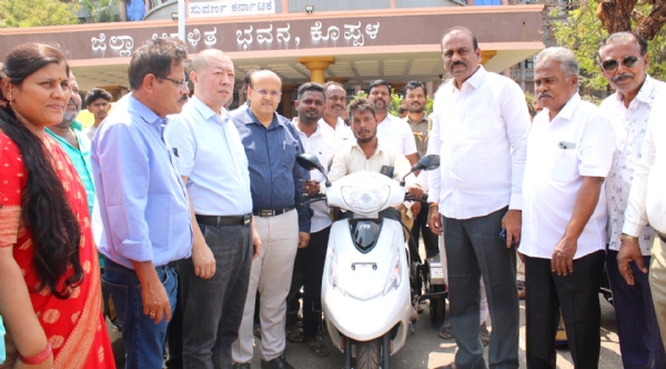 Distribution of motorized three-wheelers to the specially-abled