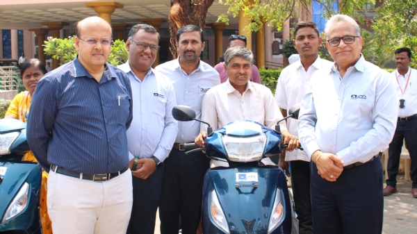 Distribution of motorized three-wheelers to the specially-abled